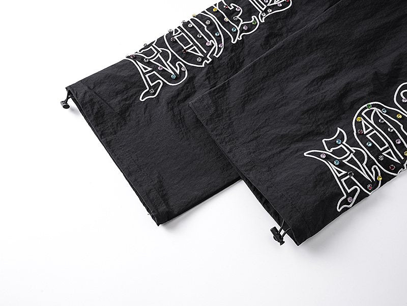 MIXED EMOTION Black Graphic Drawstring Pants — detail